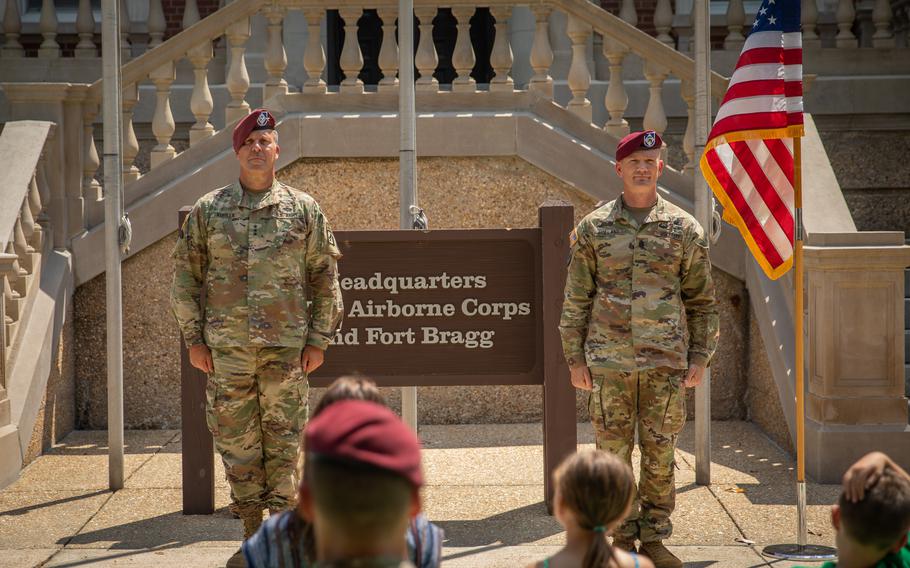 Lt. Gen. Michael Kurilla, Commanding General of XVIII Airborne Corps and Fort Bragg, stands with Command Sgt. Maj. Thomas Holland during his assumption of responsibility ceremony in front of the XVIII Airborne Corps Headquarters in Fort Bragg, NC, on June 2, 2020.