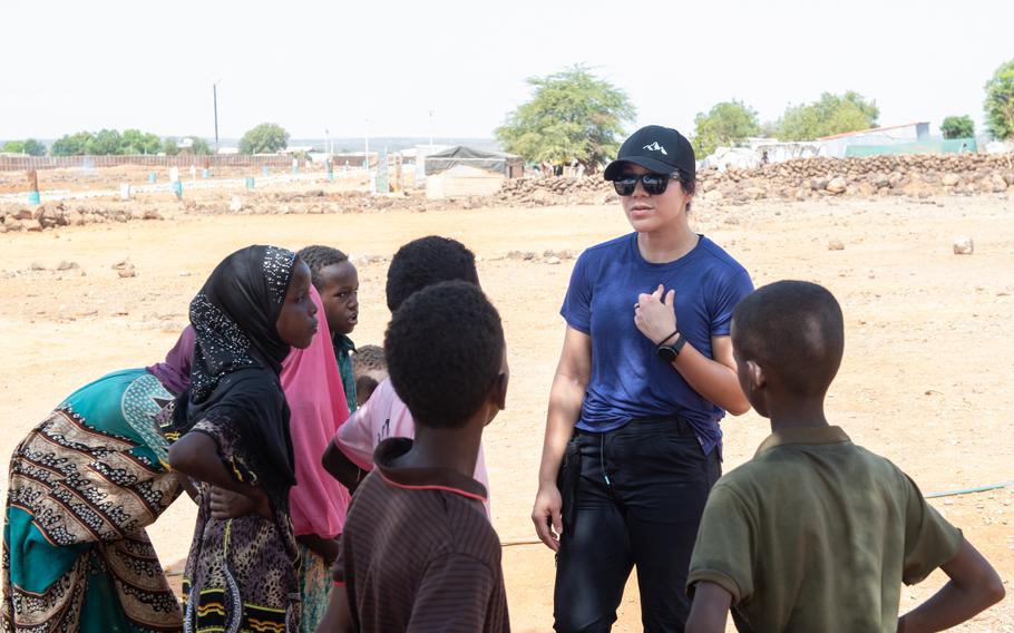 Volunteers played games and practiced English and French with children during the table delivery.