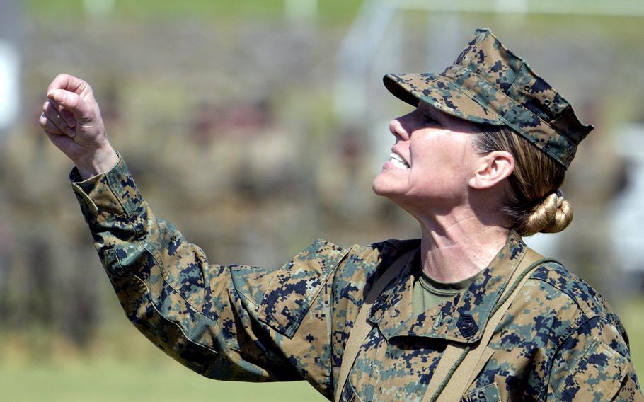 Marine Sgt. Maj. Joy Kitashima, the III Marine Expeditionary Force's new sergeant major, speaks during a relief-and-appointment ceremony at Camp Courtney, Okinawa, March 7, 2023.
