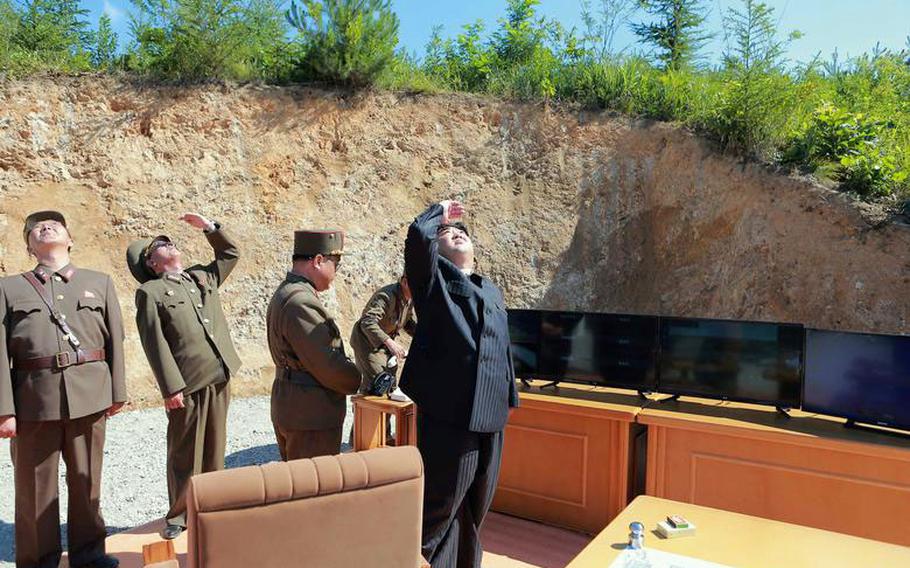 North Korean leader Kim Jong Un observes a missile launch in this photo released by the state-run Korean Central News Agency in July 2017. 