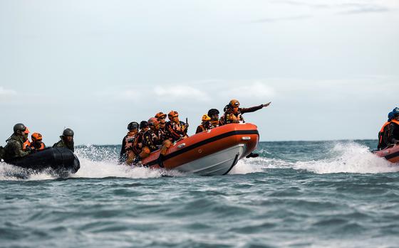 Philippine and Japanese forces work together during a Kamandag drill at Camp Cape Bojeador in Burgos, Philippines, Oct. 20, 2024. 