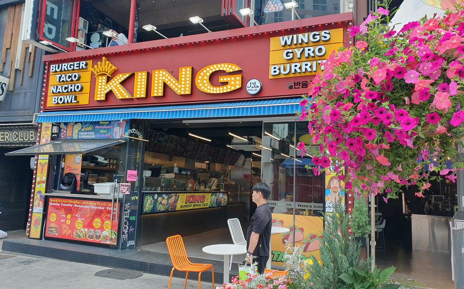 The aroma of burgers and fries, along with other items like wings and tacos, beckons you to enter King Hamburger near Osan Air Base, South Korea.