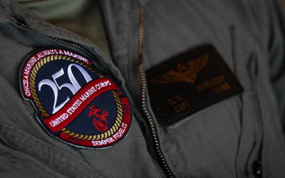 A Marine Corps 250th birthday patch is displayed on a uniform.