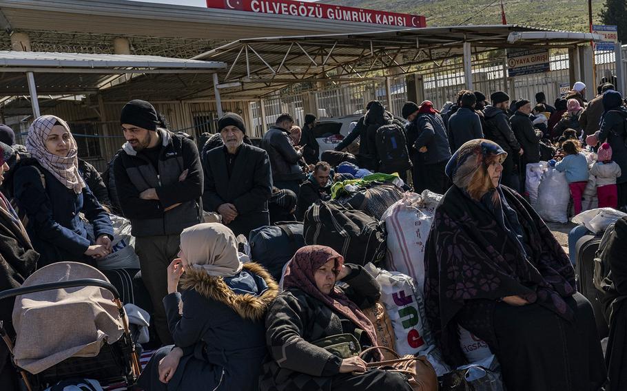 Syrians waiting to cross into their homeland have been told they will be allowed to return to Turkey, but many fear that the rules might change. 