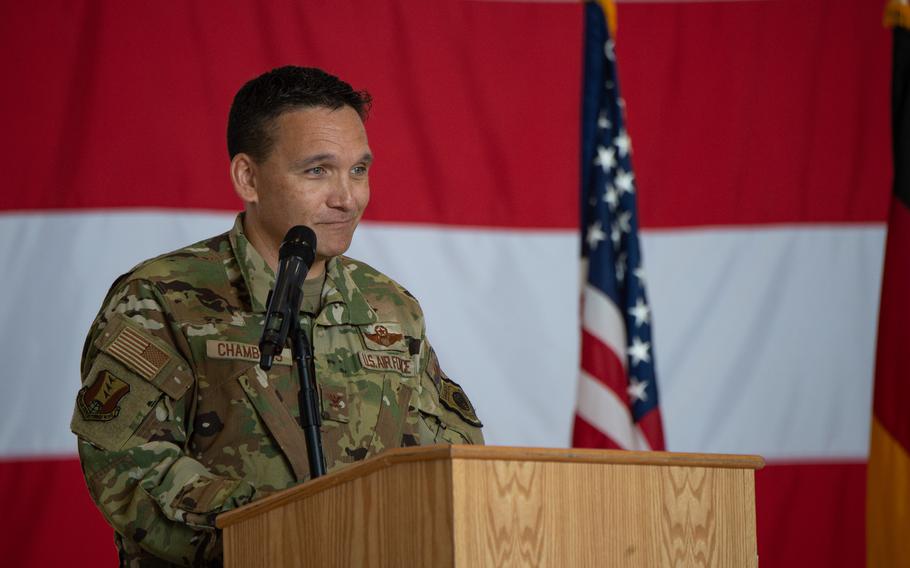 Col. Jason Chambers speaks upon taking command of the newly activated 406th Air Expeditionary Wing on June 9, 2023, at Ramstein Air Base, Germany. Chambers is a former enlisted Survival Evasion Resistance Escape instructor who was commissioned in 2003.