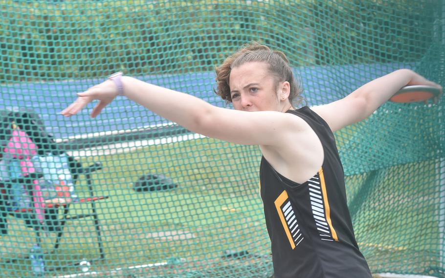 Vicenza's Jewlya Arrington spins around before letting the discus fly Saturday, April 23, 2022. Arrington, who won the virtual Far East discus title last year while attending Humphreys in South Korea, won with a throw of 98 feet, 6 inches.