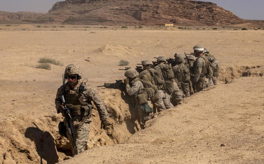 Marines maneuver through trenches in Jordan on July 13, 2023, during exercise Intrepid Maven. Small force numbers are likely to be the norm for the Marine Corps in the Middle East as it takes a new tack in the region after the wars in Iraq and Afghanistan.