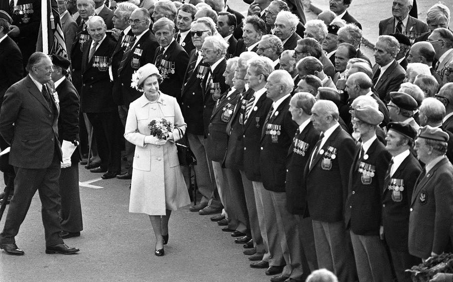 Former Queen Elizabeth II passes in front of British veterans during a ceremony in Arromanches, France, June 7, 1984 for the 40th anniversary of the D-Day landing. Arromanches was the first Normandy port to be liberated by the Allied forces. 