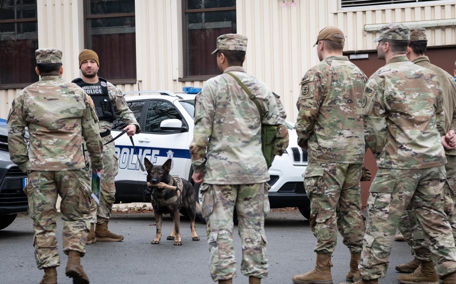 Sgt. Fabio Santana, assigned to the 100th Military Working Dog Detachment, briefs troops during a missing prisoner exercise at Sembach Kaserne, Germany, Dec. 14, 2023. 