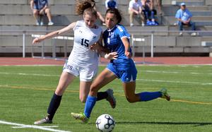 Ramstein’s Isabel Fischer, right tries to get past Lakenheath’s Mary Lowe in a Division I girls semifinal at the DODEA-Europe soccer championships in Kaiserslautern, Germany, May 18, 2022. Fischer scored the games only goal as the Royals advanced to Thursday’s final against Stuttgart.
