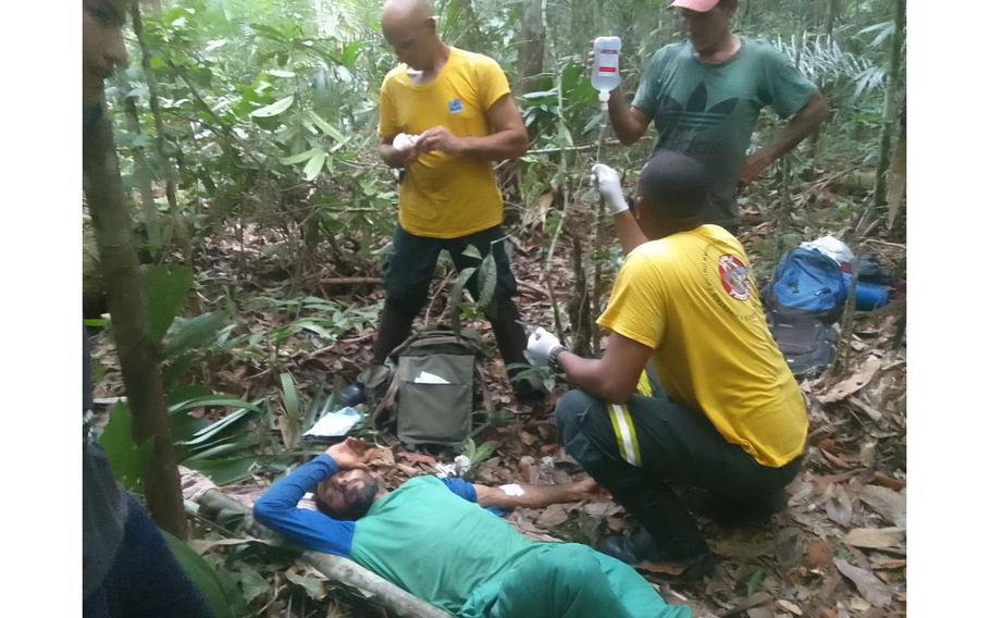 Rescuers administer first aid to Cícero José de Oliveira, a farmworker who was bitten last month by the largest venomous snake in the Americas — and endured four days without treatment deep in the Amazon rainforest. 