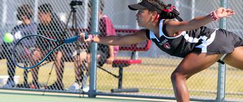 E.J. King's Miu Best lunges for a forehand return. She and her twin sister Moa teamed to win the All-Japan DODEA Tournament girls doubles, while Moa beat Miu 6-0, 6-4 to win the girls singles.