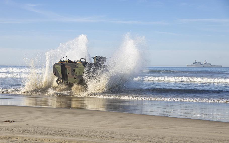 U.S. Marines assigned to the 3rd Assault Amphibian Battalion, 1st Marine Division, conduct waterborne training with an Amphibious Combat Vehicle (ACV) from shore to loading amphibious transport dock ship USS Anchorage (LPD 23) at Marine Corps Base Camp Pendleton, California, Feb. 12, 2022. 