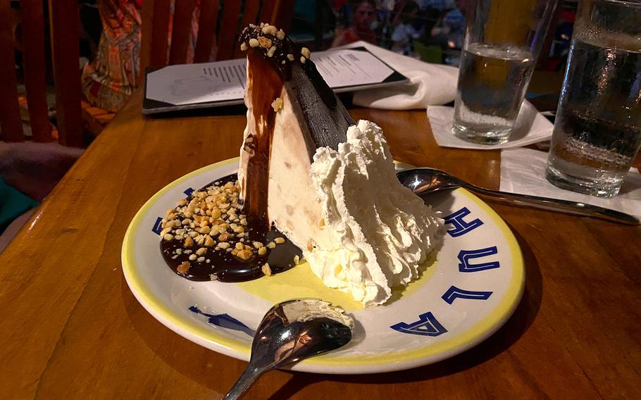 Kimo's Original Hula Pie, served at Duke's Waikiki, a beachfront restaurant that's the perfect place to watch the sunset, is a rich concoction of macadamia nut ice cream with chocolate fudge and whipped cream. 