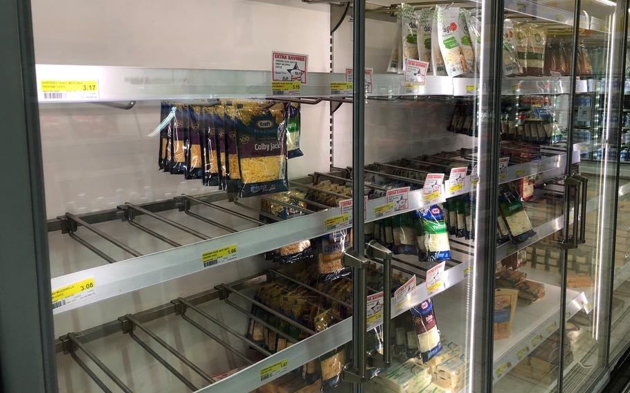 Dairy shelves at Vogelweh Commissary in Kaiserslautern, Germany, on Nov. 22, 2021. Overseas shoppers may find some commissary shelves empty as stores experience shipping delays and truck driver shortages.