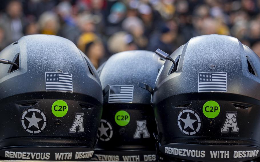 Army helmets with “Rendezvous with Destiny printed on the back.