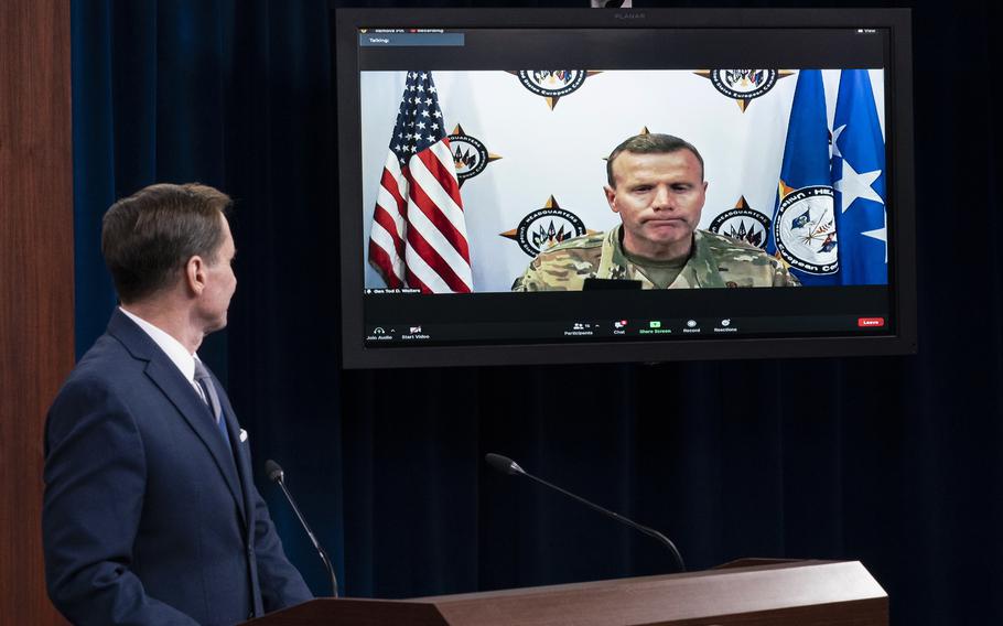 Pentagon spokesman John Kirby listens during a media briefing at the Pentagon, Thursday, Sept. 2, 2021, in Washington. Kirby is joined by U.S. Air Force Gen. Tod Wolters, commander, U.S. European Command and NATO's Supreme Allied Commander Europe, via video conference.