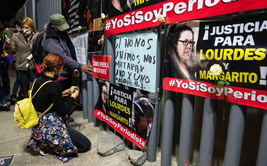 Members of the press put up signs on Jan. 26, 2022, in Tijuana, Baja California, Mexico, in front of the offices of the nation’s general prosecutor as part of a nationwide protest over the recent killings of reporter Lourdes Maldonado and photographer Margarito Martínez Esquivel.