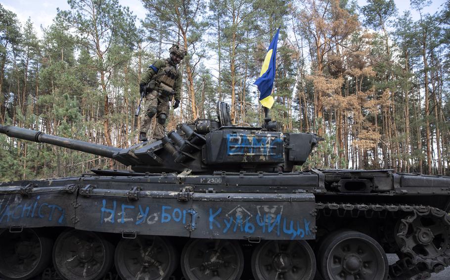 Leonid, a Ukrainian soldier, atop a tank on the outskirts of Lyman. “They’re going to need a bigger grave,” he said of Russian reinforcements. 