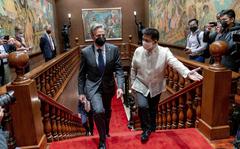 Secretary of State Antony Blinken, center left, arrives for a meeting with Philippine President Ferdinand Marcos Jr. at the Malacanang Palace in Manila, Philippines, Saturday, Aug. 6, 2022. Blinken is on a ten day trip to Cambodia, Philippines, South Africa, Congo, and Rwanda. (AP Photo/Andrew Harnik, Pool)