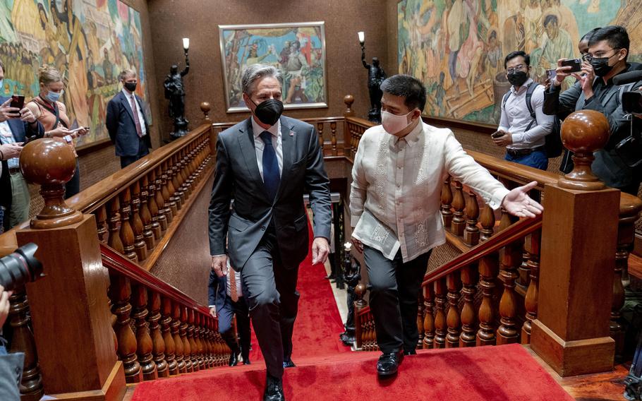 Secretary of State Antony Blinken, left, arrives for a meeting with Philippine President Ferdinand Marcos Jr. at the Malacanang Palace in Manila, Philippines, Saturday, Aug. 6, 2022.