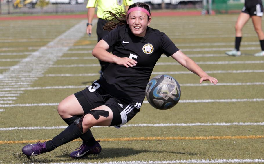 Perry's Priscilla Ramirez tries to keep her balance. She had three goals Tuesday, giving her a Pacific-leading 52 this season.
