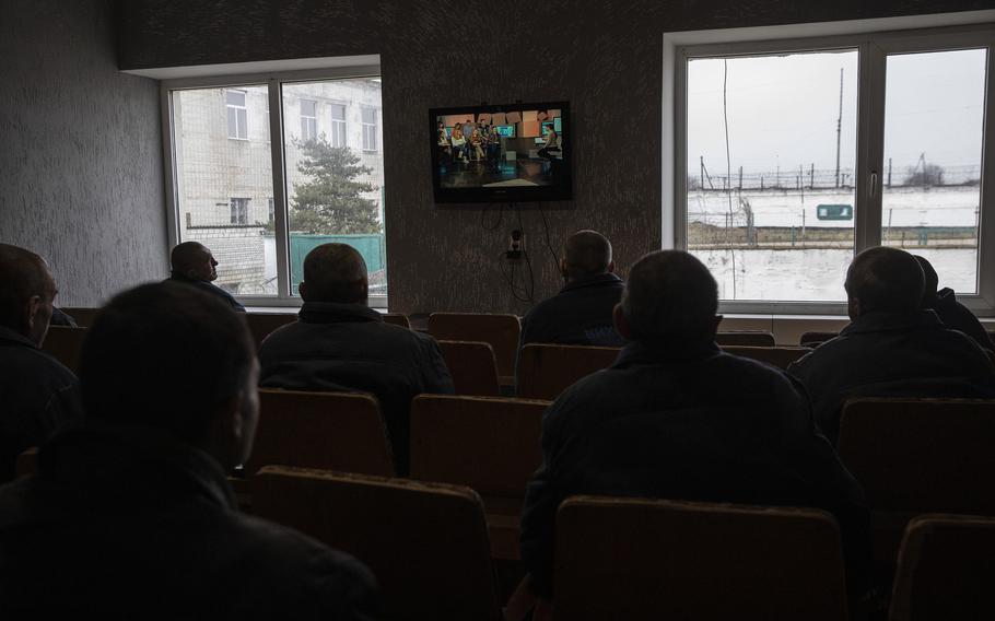 Russian prisoners watch a Ukrainian television channel.