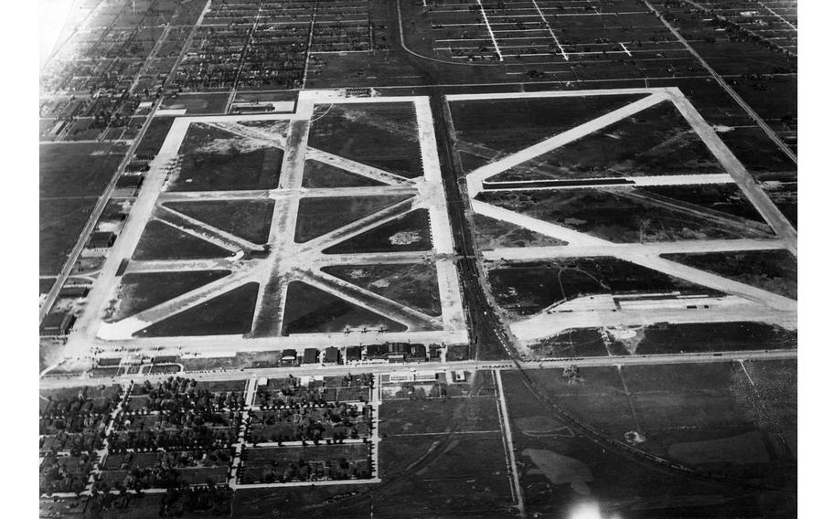 An aerial view of the Chicago Municipal Airport, now called Midway, shows how the airport was bisected by railroad tracks until 1940.