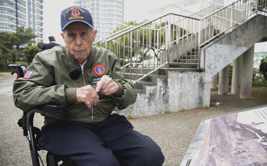 A Marine Corps veteran sitting in a wheelchair speaks about his wartime experiences. 