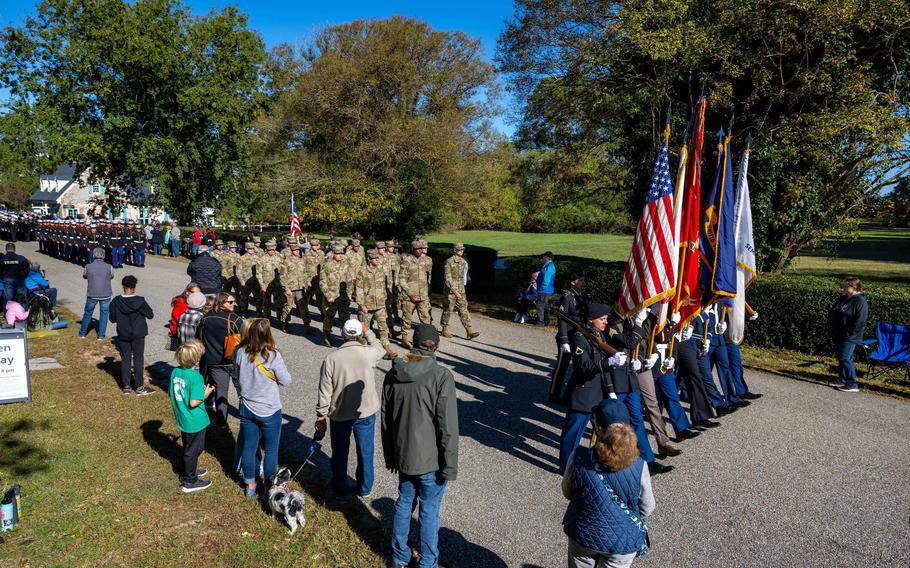 Service members march in the Yorktown Parade in Fort Eustis, Va., on Oct. 20, 2022. A recent Gallup poll gauged public trust in the military at 60%, the lowest in 26 years.
