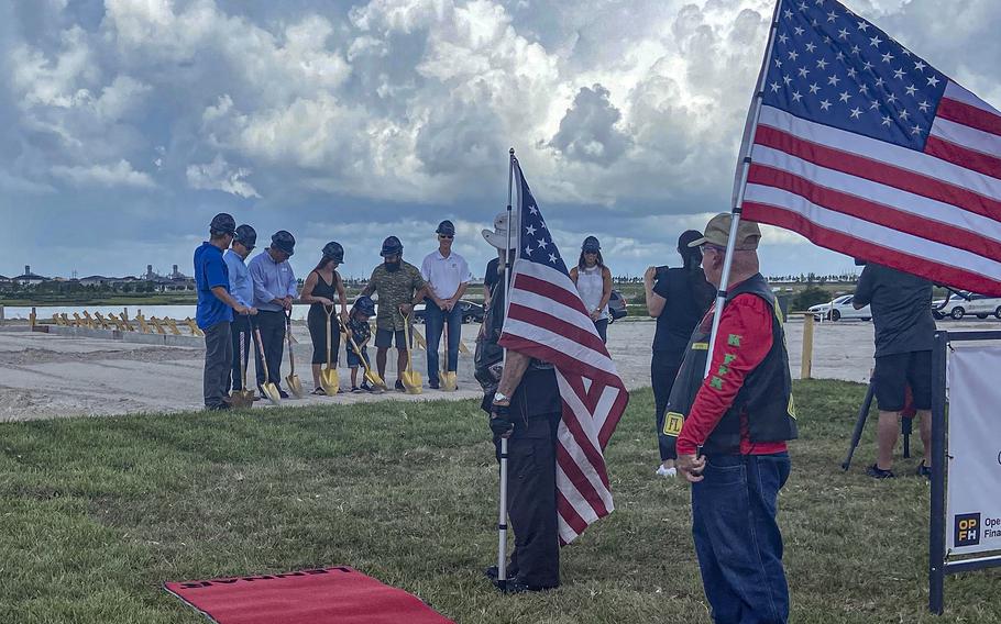 The Jimenez family breaks ground at the site of their new home in Loxahatchee, along with representatives from the construction company Lennar, Arden and Operation Finally Home.