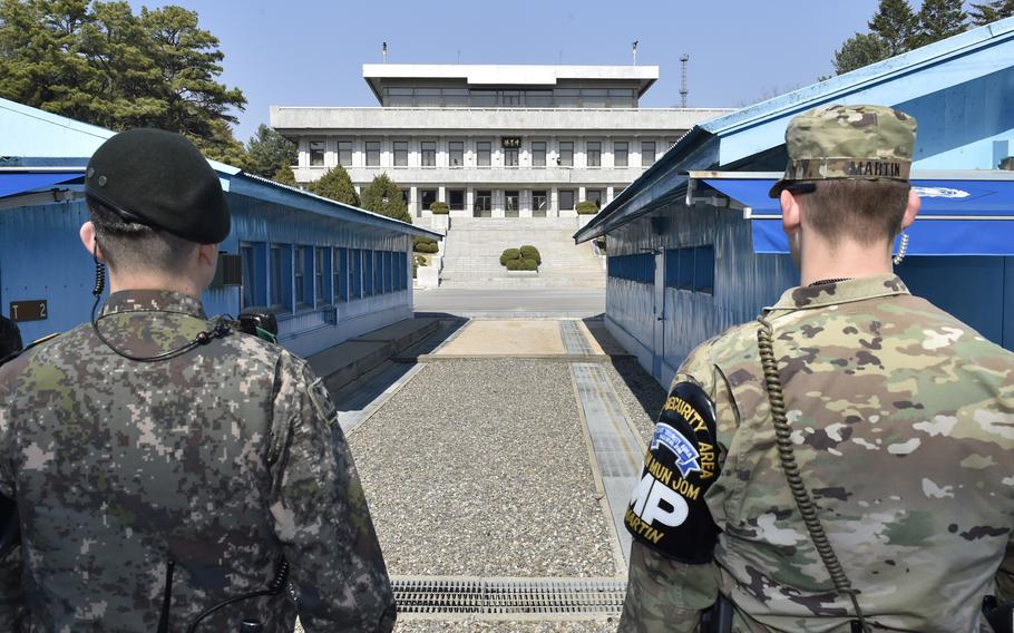 U.S. and South Korean soldiers stand guard at the Demilitarized Zone between North and South Korea, on April 3, 2017. 