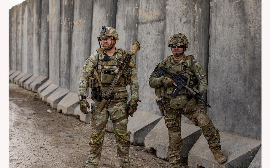U.S. Army Sgt. Robert Russell and Staff Sgt. Dexter Robertson, assigned to Bravo Company, 1st Battalion, 118th Infantry Regiment, 37th Infantry Brigade Combat Team, Combined Joint Task Force - Operation Inherent Resolve, prior to a patrol, Syria, Feb. 3, 2023. 