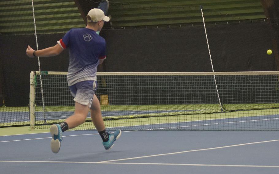 Ramstein’s Tristan Chandler hits the ball on the run during a match on Friday. Oct. 21, 2022, at the DODEA European tennis championships at Wiesbaden, Germany. Chandler will seek to defend his 2021 singles title on Saturday.