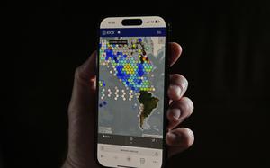 Data from the Integrated Ocean Observing System is displayed on a cell phone.