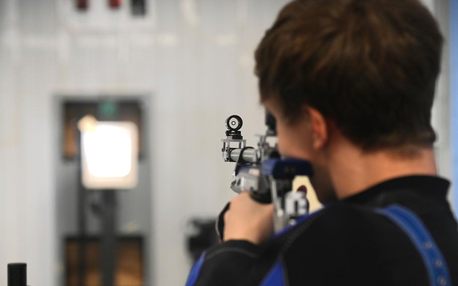 Ansbach’s Kenton Duplessie puts pellets to paper in the standing position during the DODEA-Europe marksmanship competition at Vilseck High School on Dec. 9, 2023.