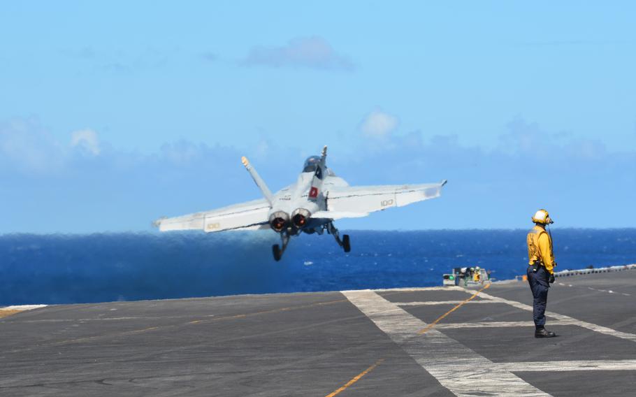 An F/A-18 Super Hornet takes off from the USS Carl Vinson on Aug. 14, 2021, as the carrier steamed north of Hawaii during Large-Scale Exercise 2021.