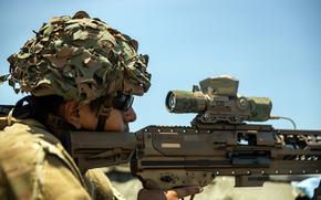 U.S. Army Pfc. Bryan Lamas, of the 25th Infantry Division, aims an M250 machine gun while training in Aparri, Philippines, May 1, 2025. 