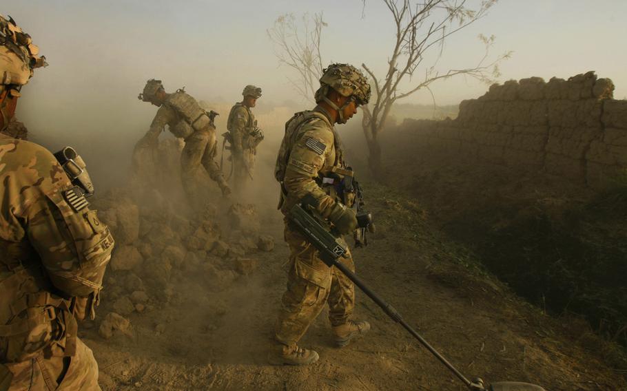 Sgt. Ramone Villablanca uses a “minehound” to check for improvised explosive devices.