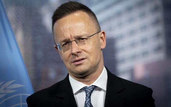 Peter Szijjarto, Minister of Foreign Affairs of Hungary, is interviewed by The Associated Press, Friday, March 24, 2023, at United Nations headquarters. Szijjarto said Friday that his country has not voted on whether to allow Finland and Sweden to join NATO because Hungarian lawmakers are sick of those countries' critiques of Hungarian domestic affairs. (AP Photo/John Minchillo)