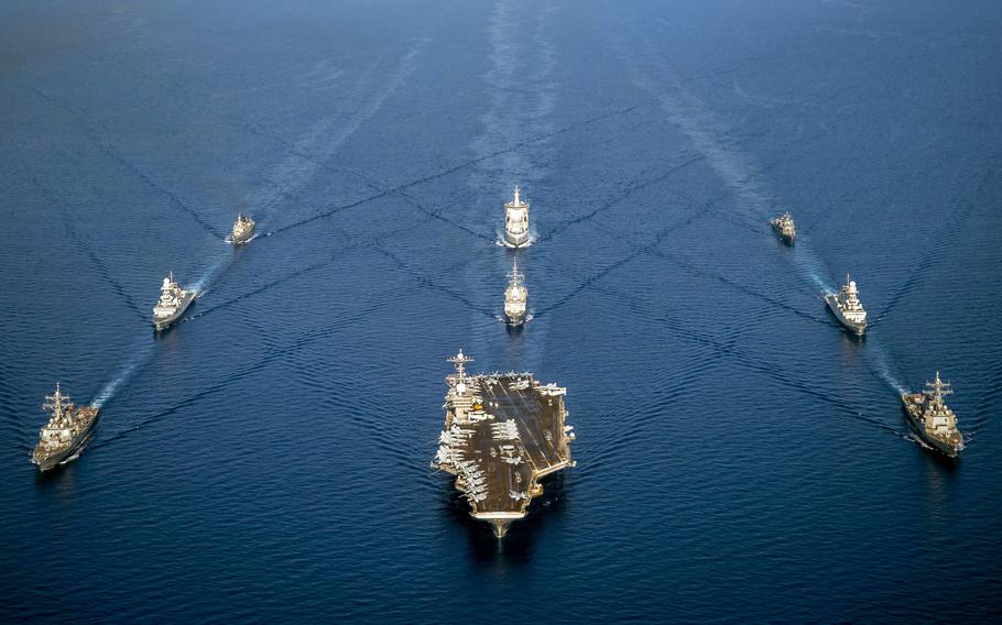 Ships from the aircraft carrier USS Harry S. Truman, the destroyer USS Cole and the Italian navy frigate ITS Alpino sail in formation in the Mediterranean Sea, on July 24, 2022. Russia released a new maritime doctrine this week that identifies the U.S. and NATO as the country’s chief threats. 