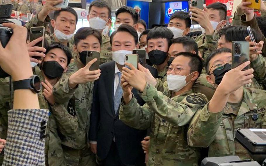 South Korea's then-president elect Yoon Suk Yeol visits 2nd Infantry Division soldiers at Camp Humphreys, South Korea, April 7, 2022. 