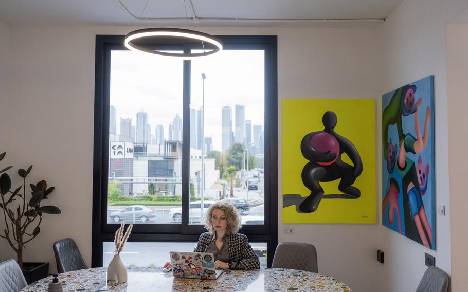 Alexandra Dorf in a cafe that she uses as her workspace in Dubai, where she moved from Russia last April with her two children.