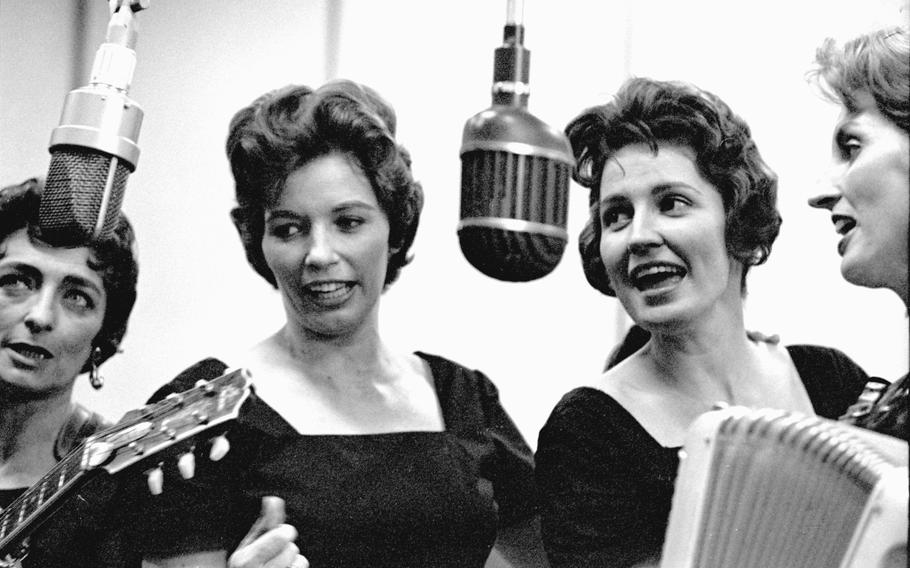The Carter Family — mother Maybelle, June (the future wife of Johnny Cash), Anita and Helen — on the air at AFN's studio in Frankfurt, Germany, in 1961 during their two-week tour of U.S. bases in Europe.