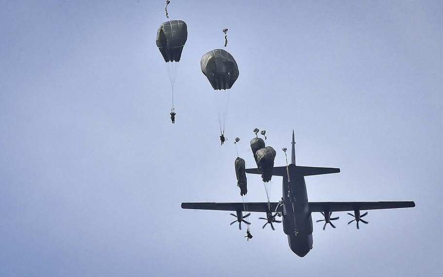 Soldiers from the 173rd Airborne Brigade leave a C-130 Hercules during an all-female jump onto the Juliet Drop Zone near Vajont, Italy, on March 14, 2024.