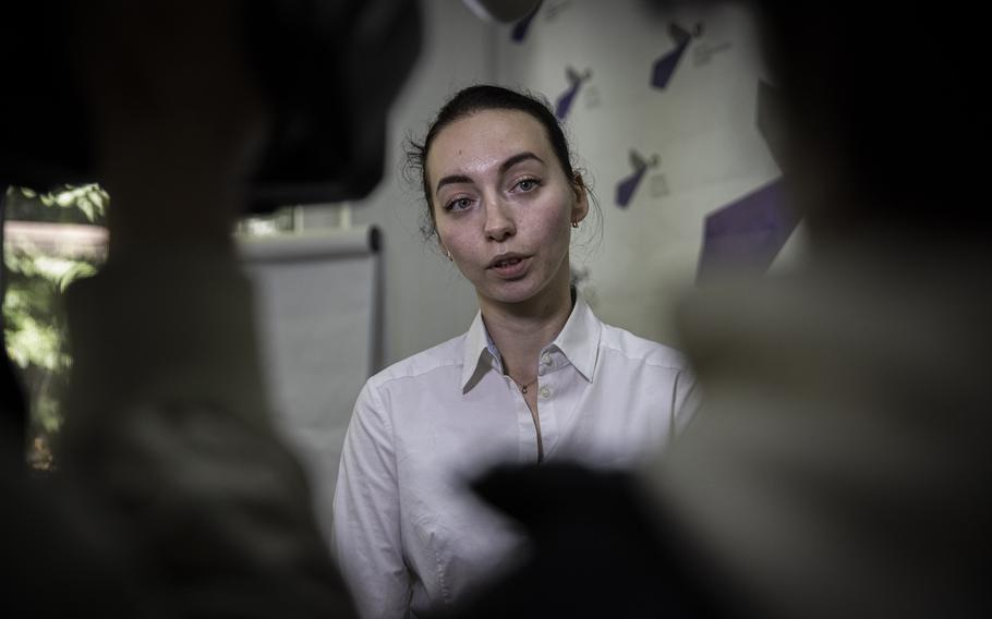 Anna Popova of the Centre for Civil Liberty talks to journalists as staff celebrate in their office on Oct. 7, 2022, in Kyiv, Ukraine. The Ukrainian human rights organization received the 2022 Nobel Peace Prize along with human rights advocate Ales Bialiatski from Belarus, and the Russian human rights organization Memorial, which was shut down earlier this year. 