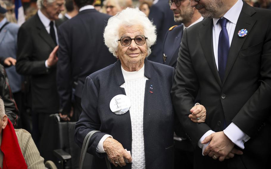 Holocaust survivor Ester Senot, 97, attends a commemorative ceremony to mark the 80th anniversary of the return of the deportees, in Paris, France, Sunday, April 27, 2025.