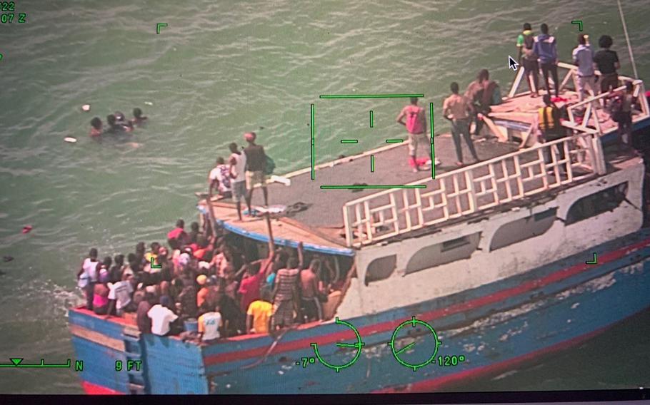A wooden boat packed with migrants from Haiti arrived in the shallow waters off Ocean Reef Club in Key Largo on March 6, 2022.