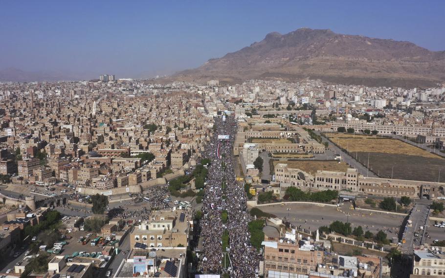 Houthi supporters attend a rally marking the seventh anniversary of the Saudi-led coalition’s intervention in Yemen’s war, in Sanaa, Yemen.