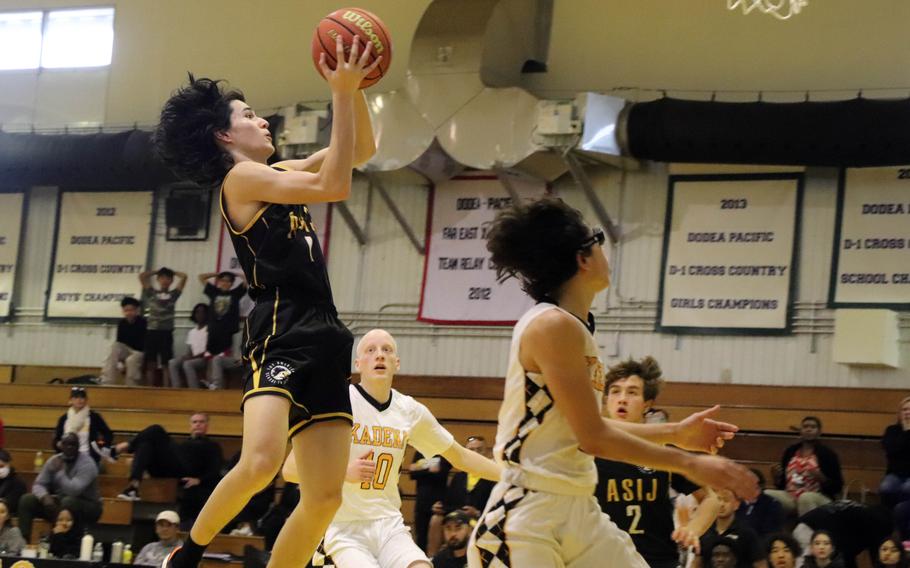 ASIJ's Sid Abelson goes up to shoot against Kadena. The Panthers won the Boys D-I semifinal 60-44.